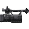 Sony HXR-NX100 Full HD NXCAM camcorder shown from side angle with lens and controls visible.