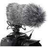 Azden SWS-15 furry windshield cover for audio accessories, shown on camera for wind noise reduction.