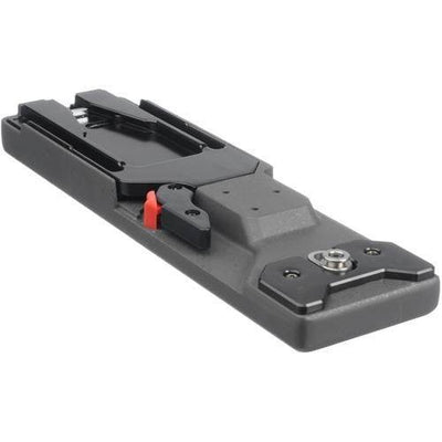 Sony VCT-14 quick-release tripod adapter attached to a video camera, enabling easy mounting and secure support for Sony video cameras.